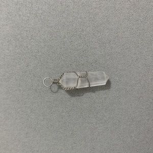 white gemstone pendant